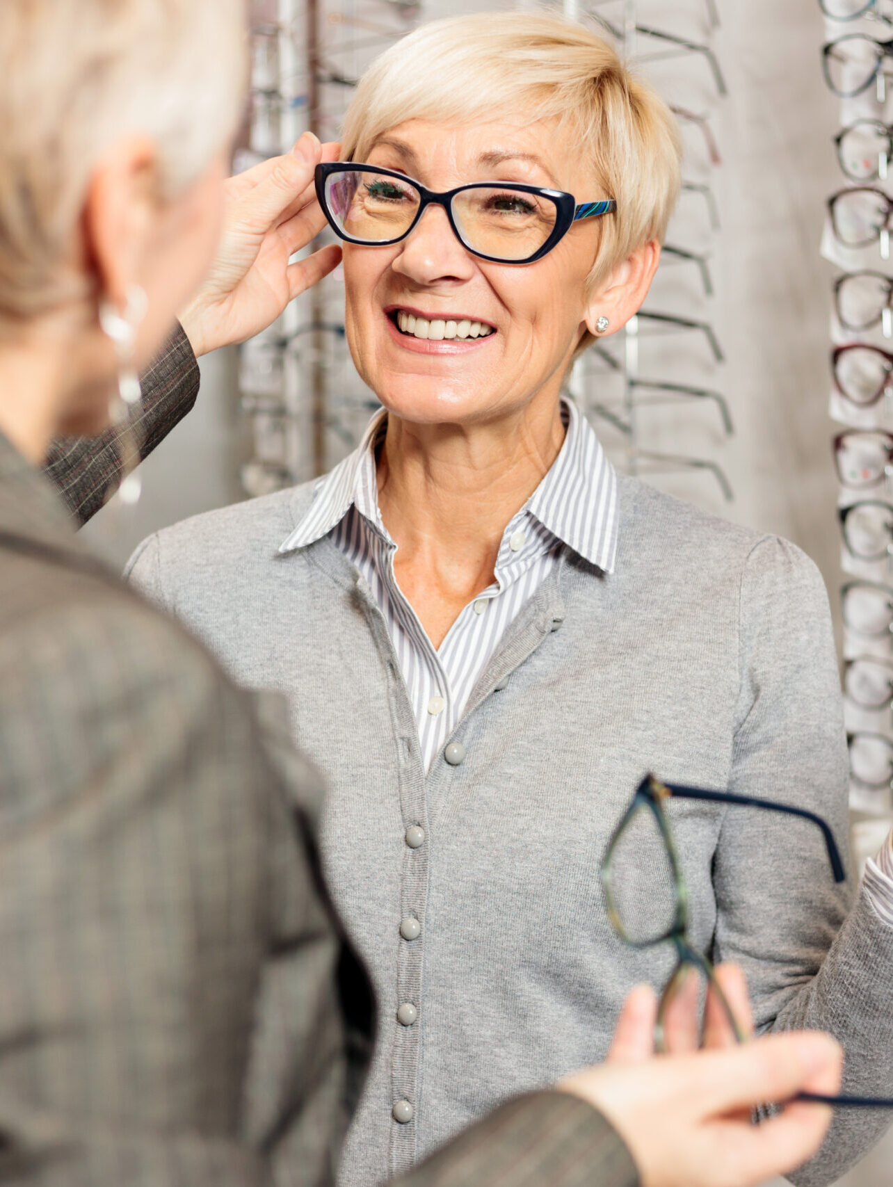 Mature,Female,Seller,Helping,Smiling,Senior,Woman,To,Choose,Prescription